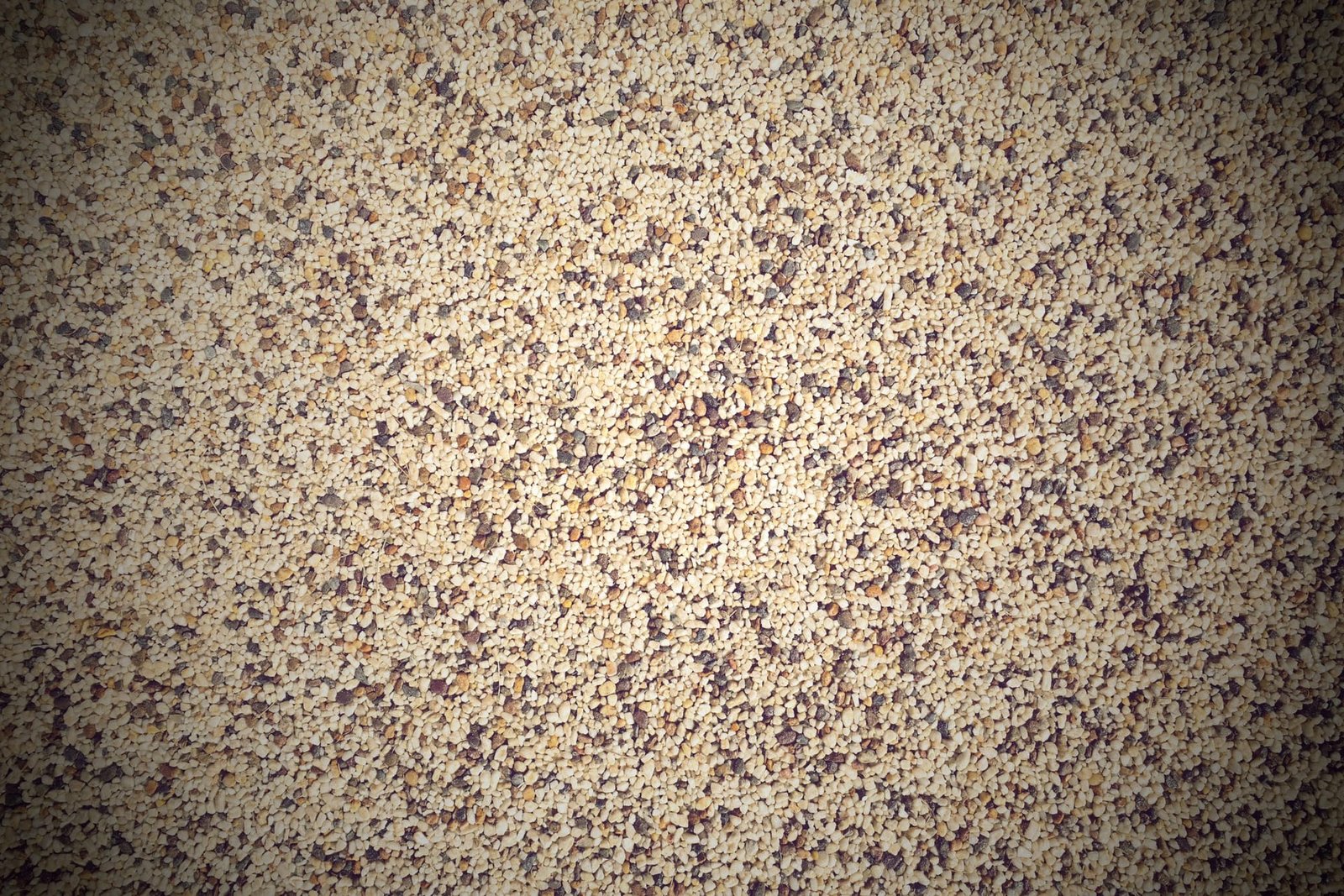 Resin bound aggregate up close at Lusail Boulevard, every stone coated and locked in place
